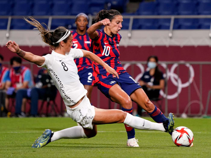Carli Lloyd dribbles vs. New Zealand